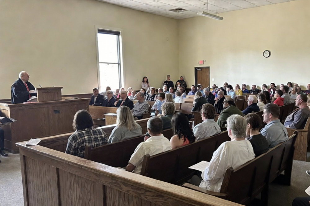 Indiana county courtroom filled with people during eviction hearings in 2026 – judge addressing crowded gallery of litigants and attorneys, Fritch Law Office
